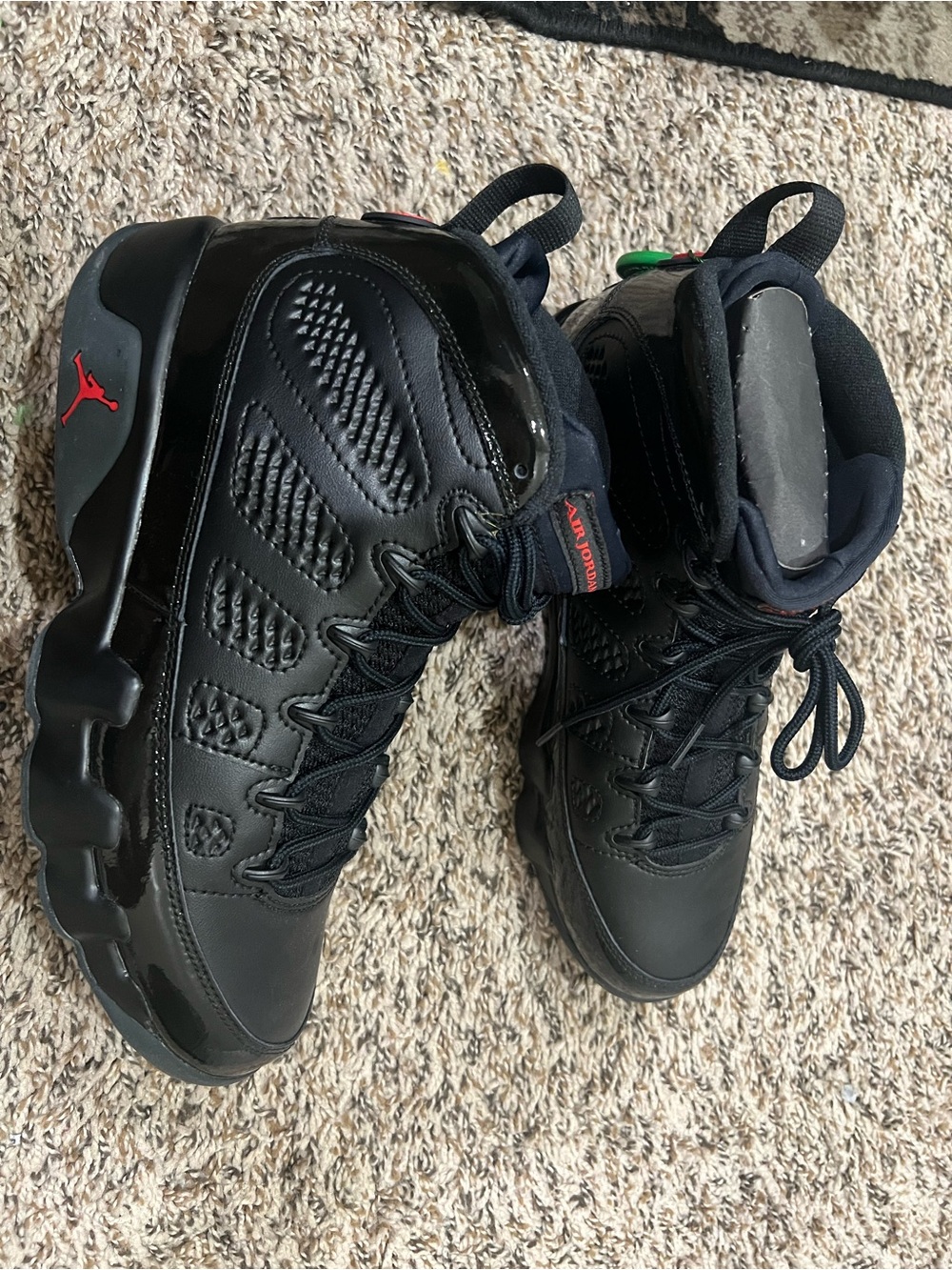 Jordan Black High-Top Basketball Sneakers with Red Accents